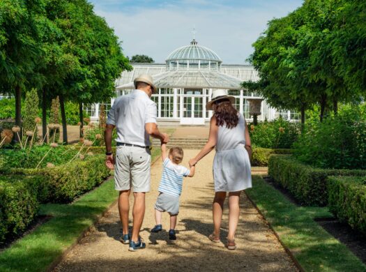 Family with a child walking